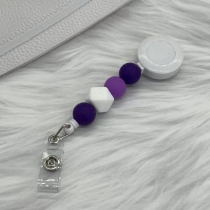 Badge Reel Purple And White